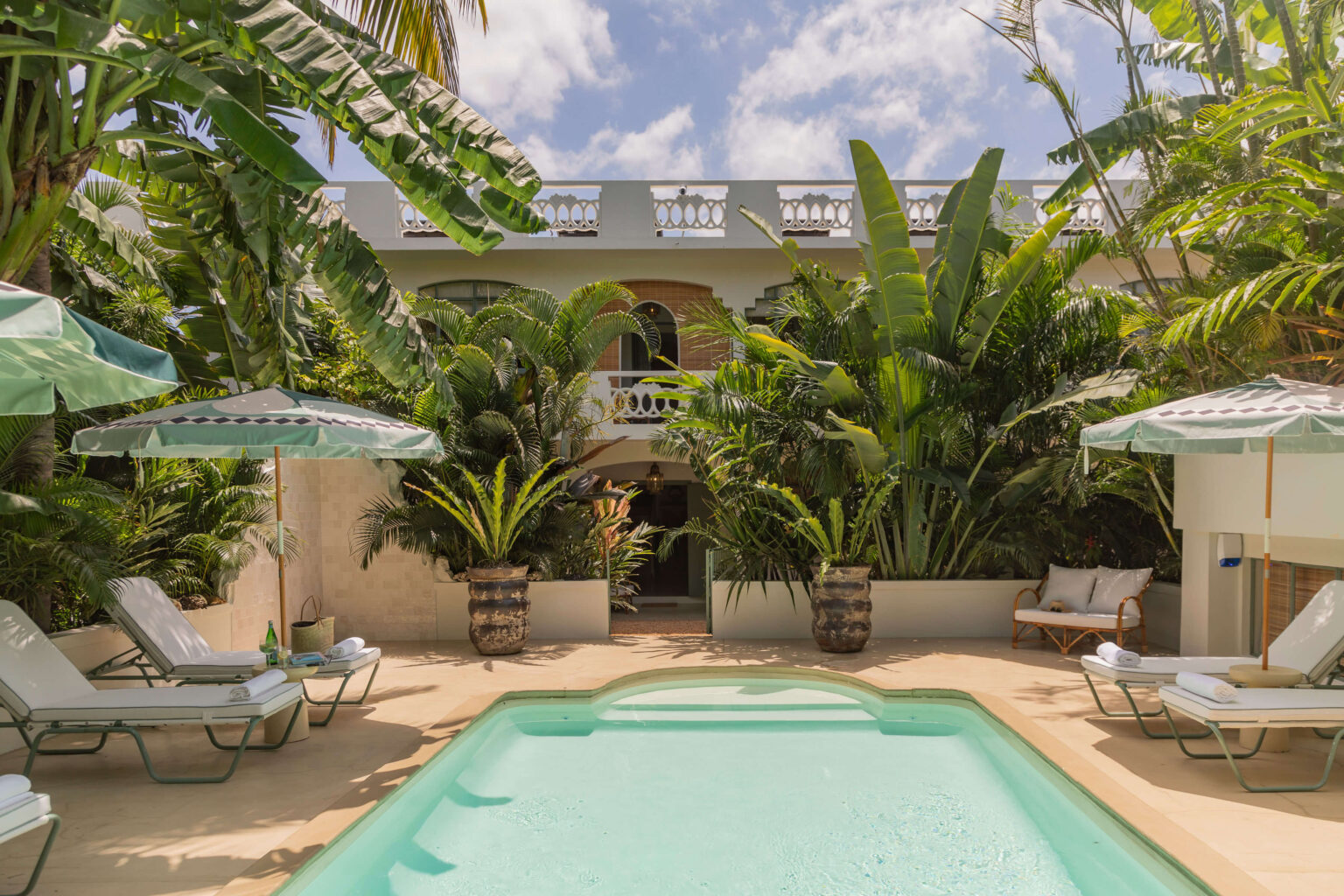 Suites set within a lush tropical garden, creating a sense of seclusion