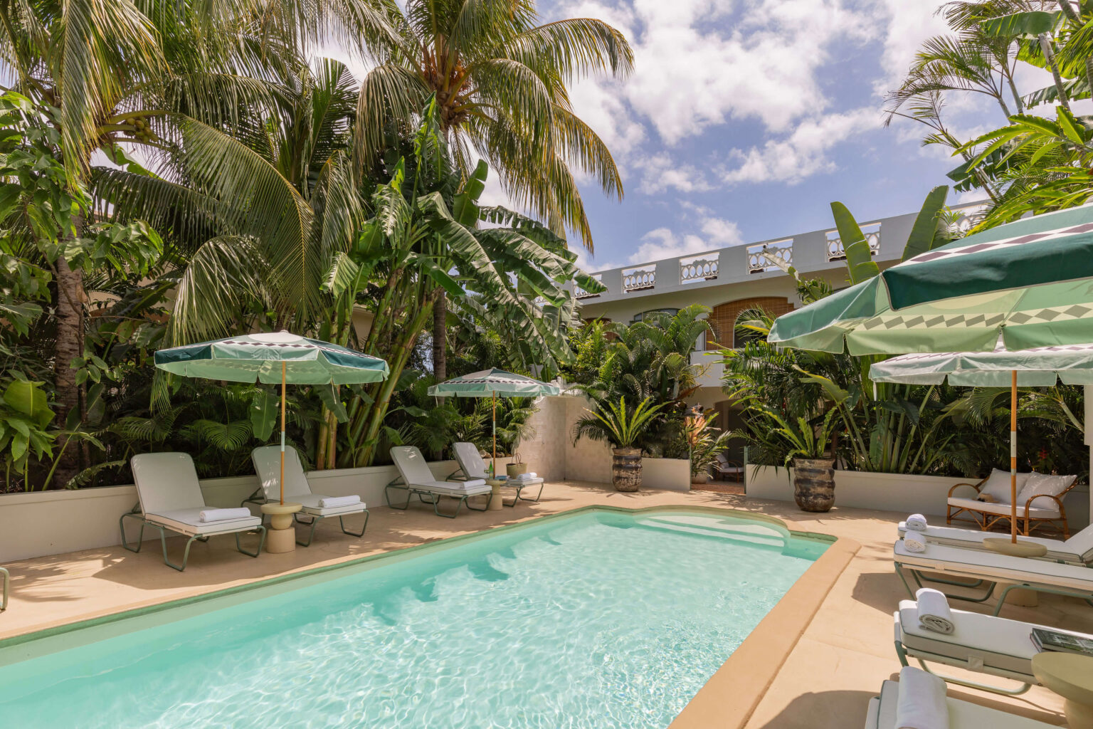 A pool shared by only three suites, generous in scale and unhurried.